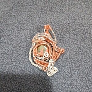 Handcrafted Copper and Silver Wire Wrapped Pendant with Green-Brown Stone